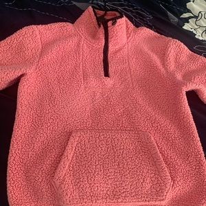 An orangish pink color combo of PINK SHERPA medium size